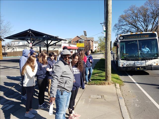 Darryl Gaston (center) from NECC led the neighborhood tour and Sustain Charlotte led the walkability audit.We saw several transit riders waiting at this stop.