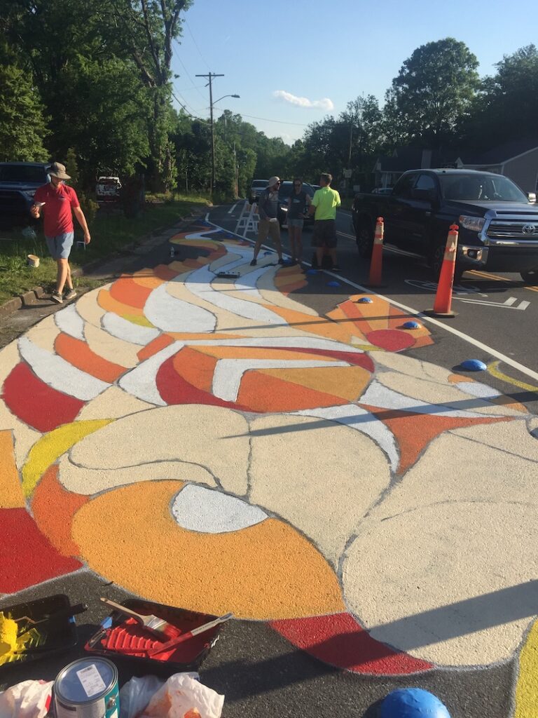 Completed sidewalk chalk mural koi fish