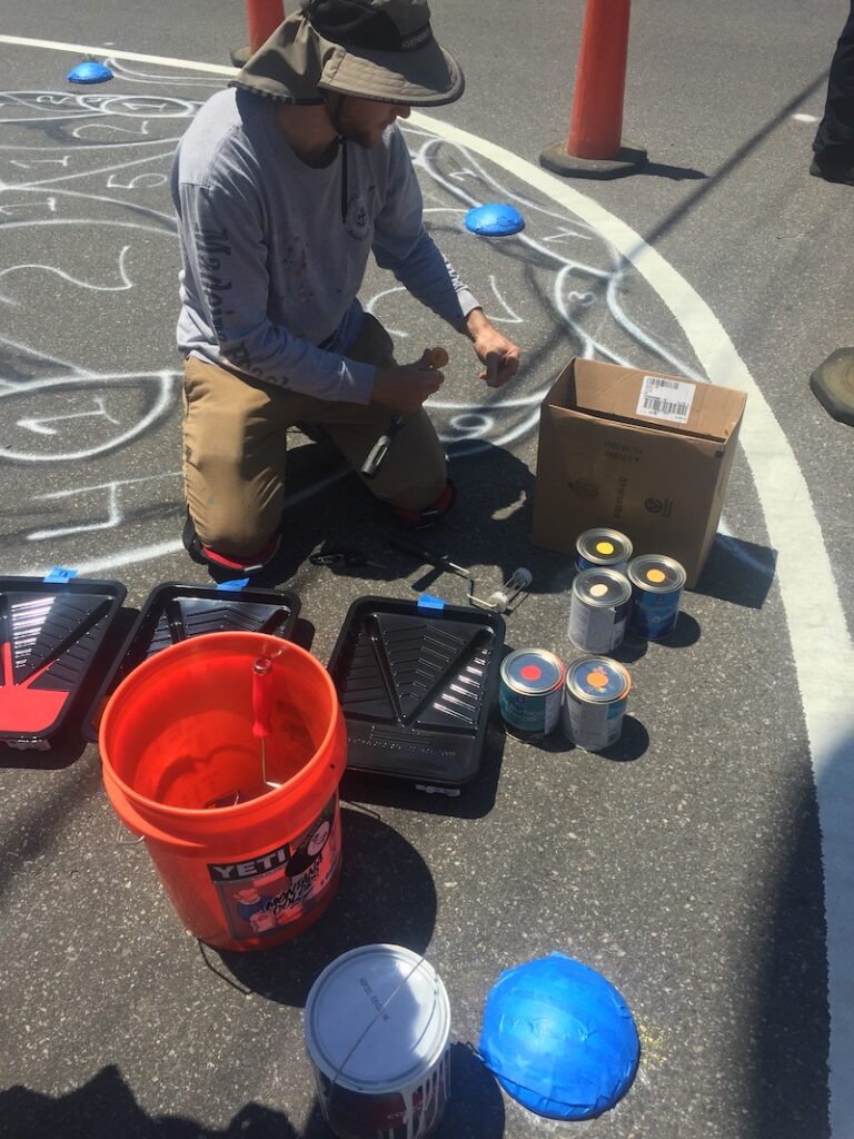 Preparing to paint sidewalk 2