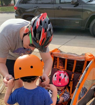 Will Pellisero with Child on bike