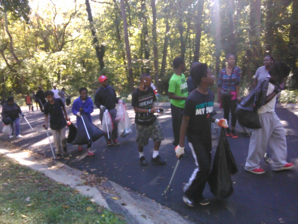 More than 30 adult and youth residents participated in Reid Park’s clean-up.
